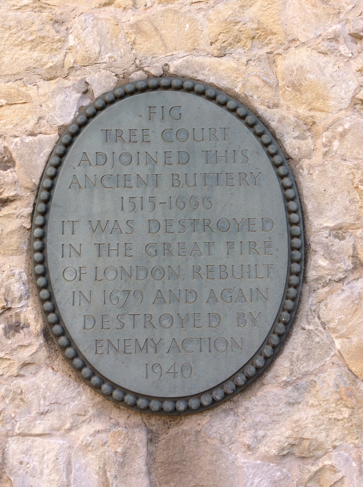 Plaque on ancient buttery mentioning Fig Tree Court